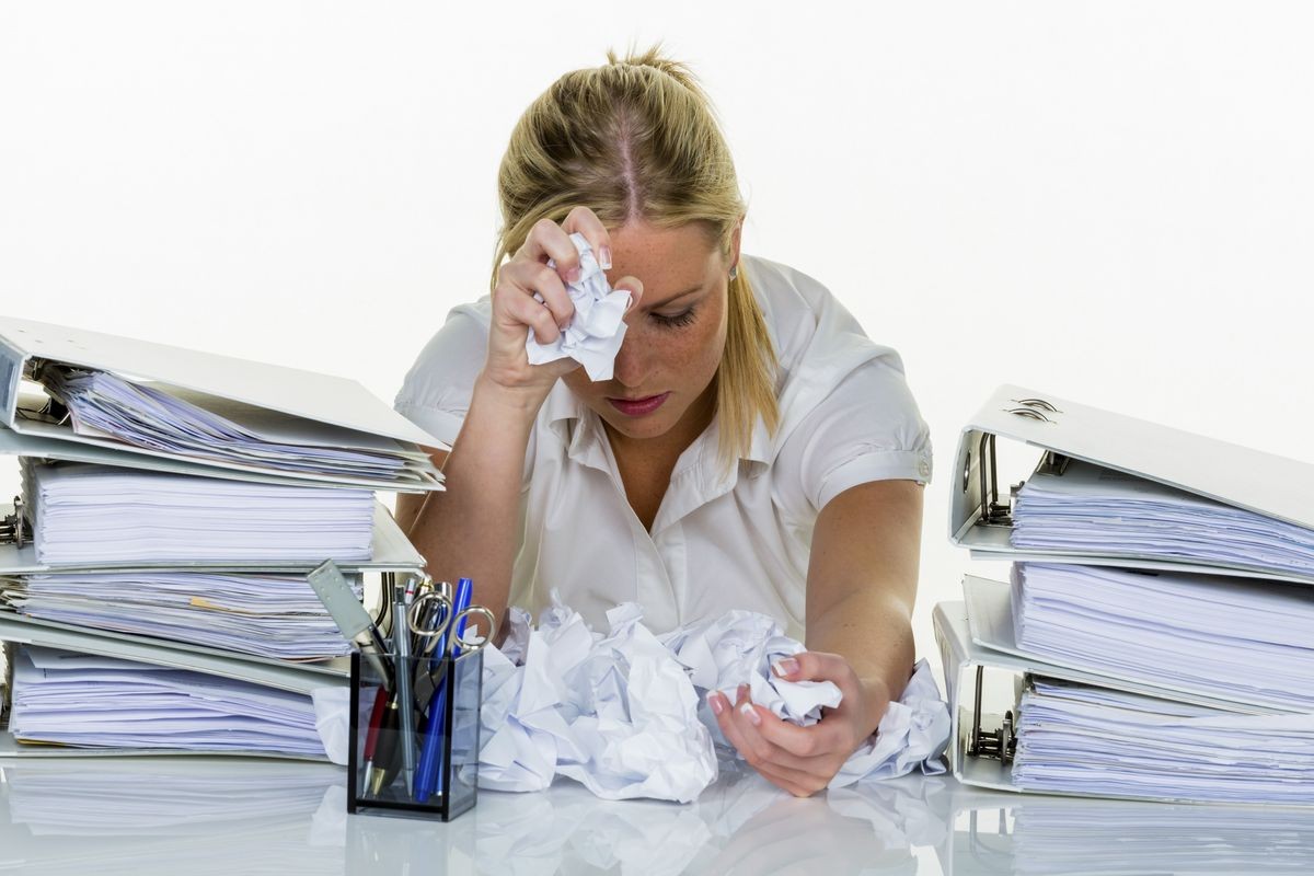 woman in office with burnout